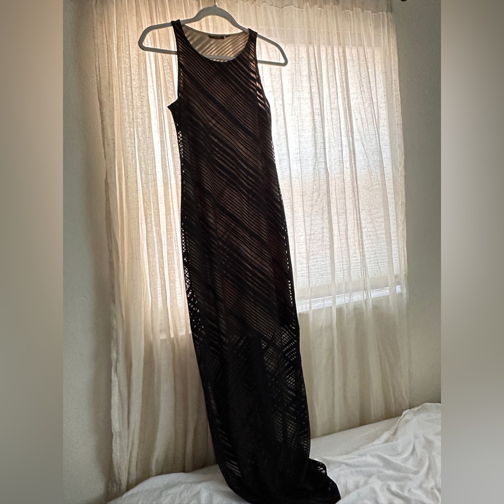 Skin tone with black overlay dress